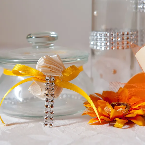 Barattolo decorato per la confettata, con fiocco e fiore